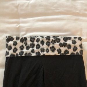 Pink yoga pants. Black size med. pink in back are black sequins